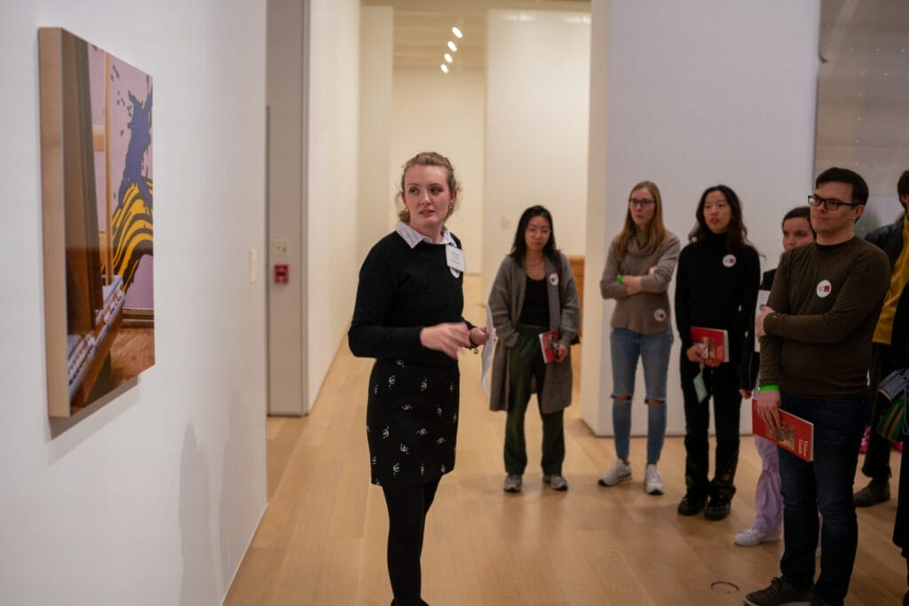 A picture of a graduate student giving a gallery talk at the Art Institute of Chicago.