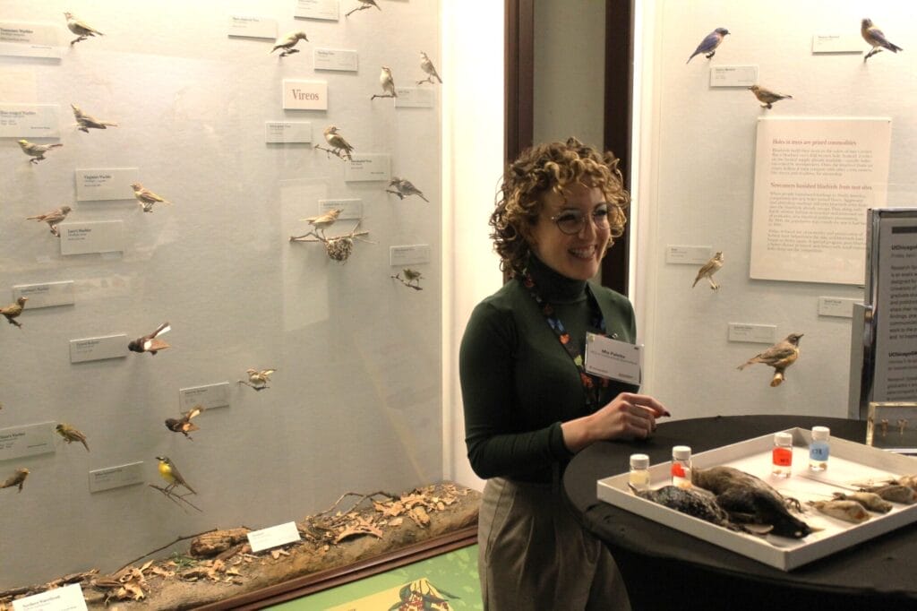 A PhD students presenting their research at The Field Museum.