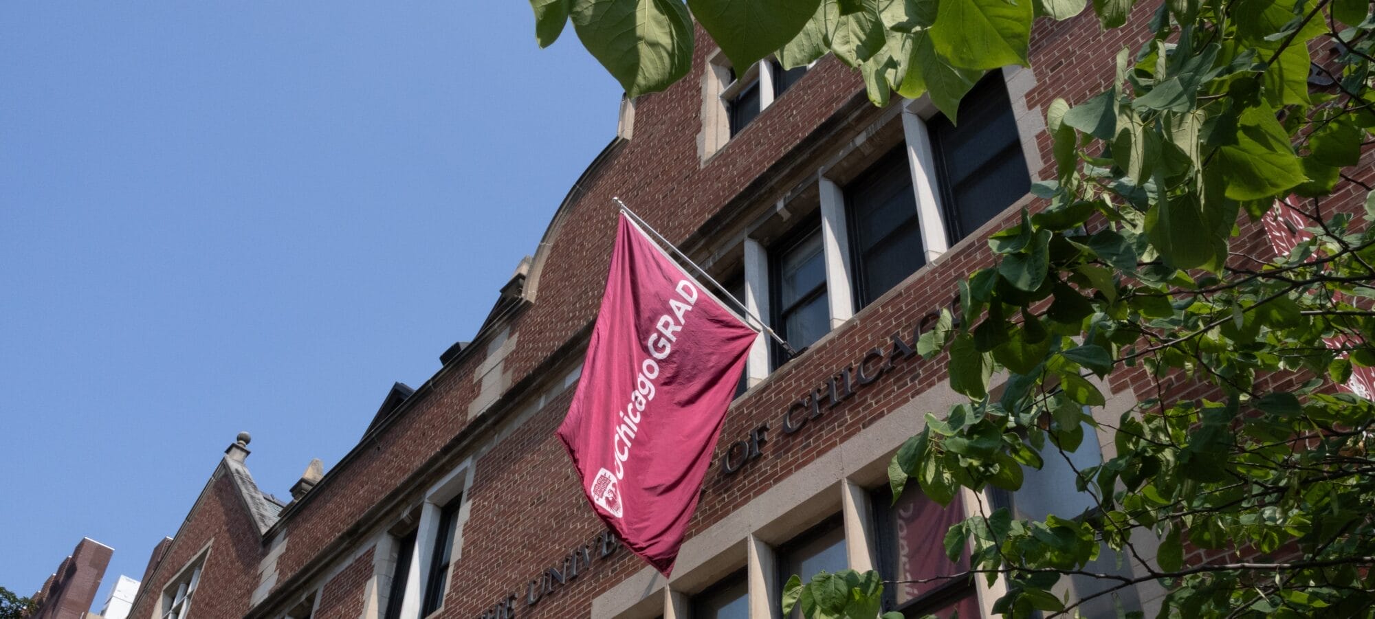 Photo of the UChicago bookstore and UChicagoGRAD flag